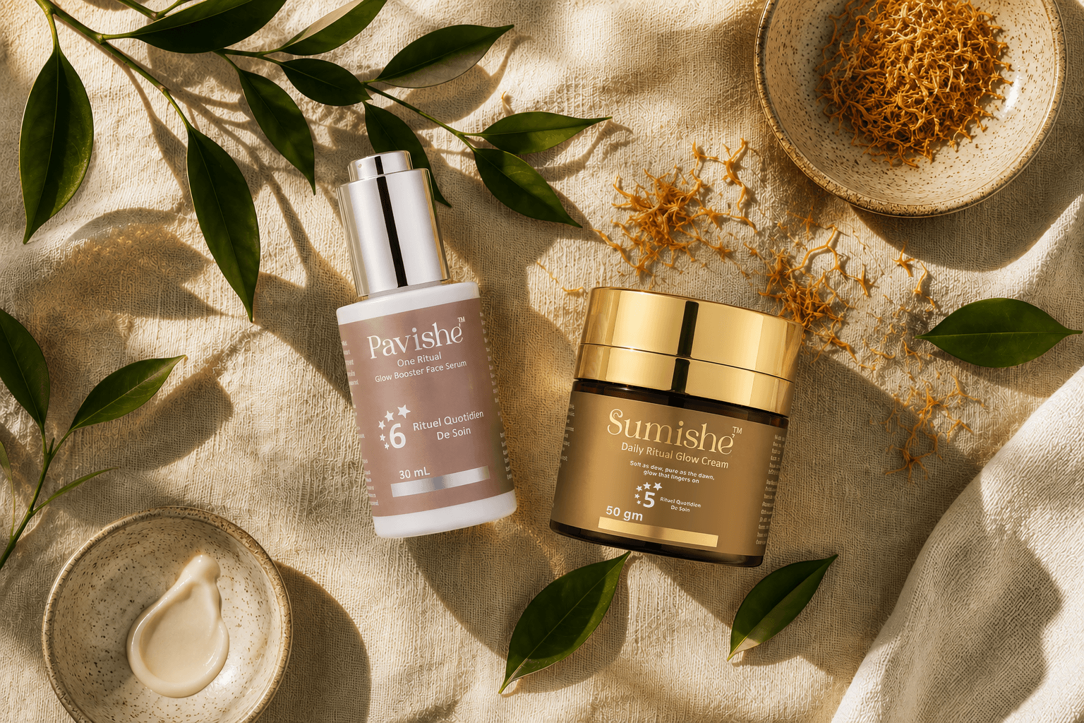 Ishi Luxe serum and cream arranged with botanical leaves